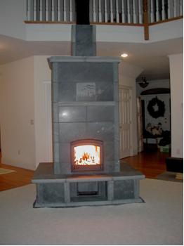 2700 Tulikivi Fireplace with Benches in New Hampshire