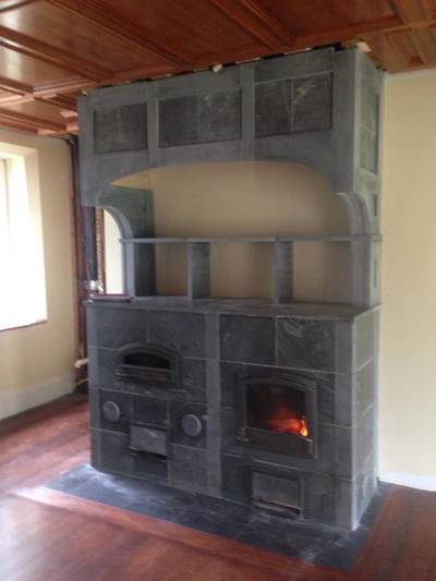 Side-by-side Fireplace and Bakeoven with Soapstone Hood Custom Tulikivi in Gloucester, Massachusetts